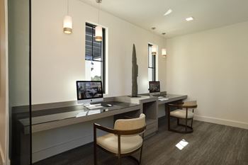 Office area with yellow lights at Azola West Palm Beach, West Palm Beach
